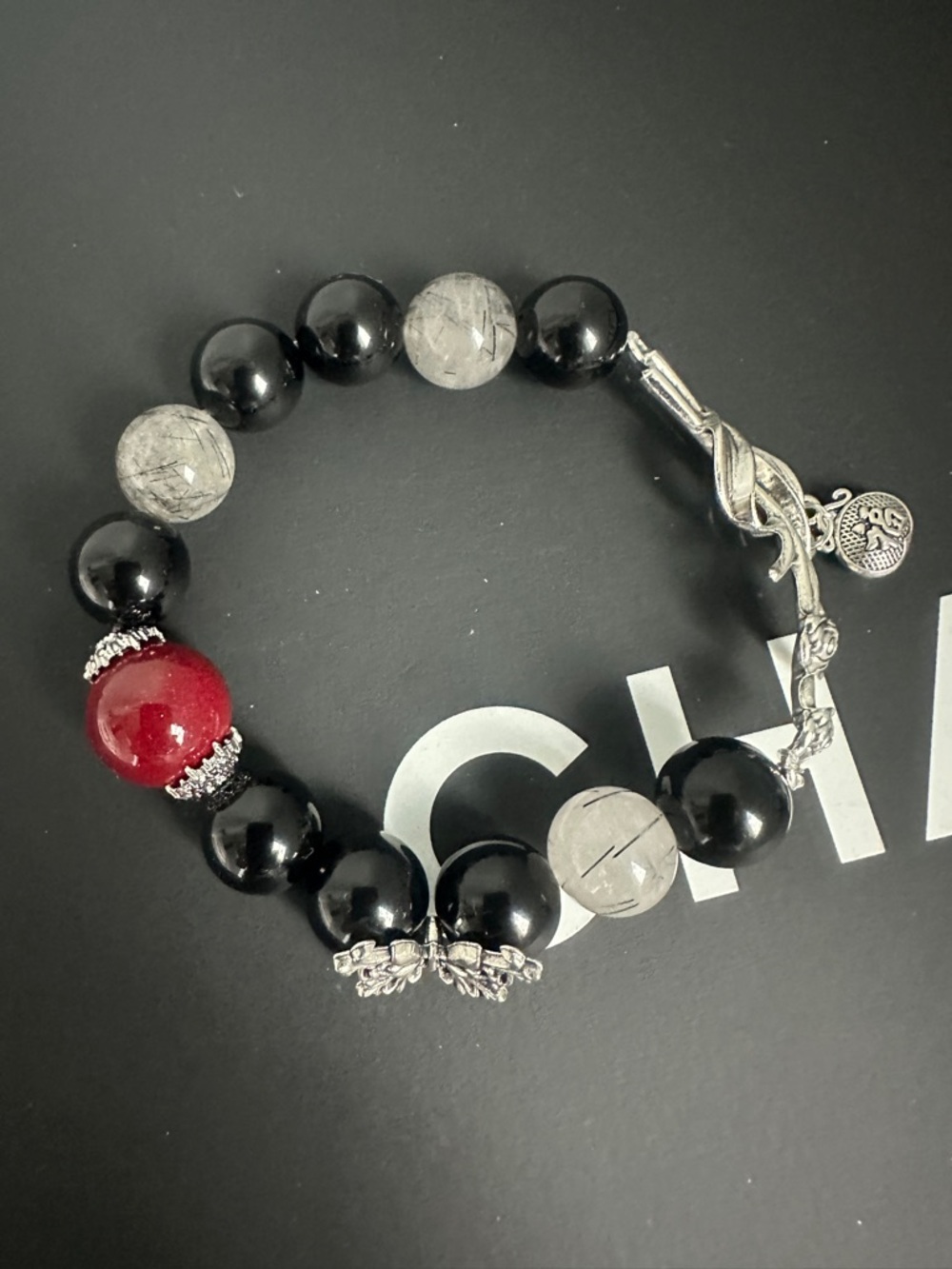 Elegant handmade bracelet with Obsidian, Cinnabar, Black rutilated quartz.
